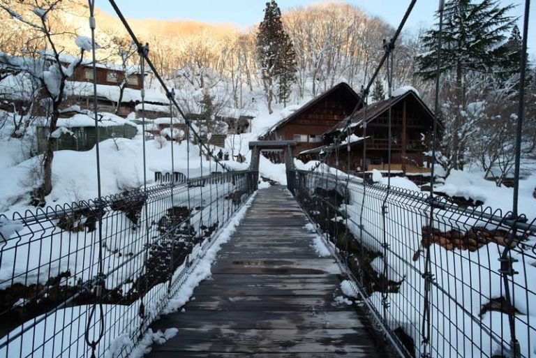 This Hidden Hotel Is Home to Japan's Most Scenic River Hot Springs ...